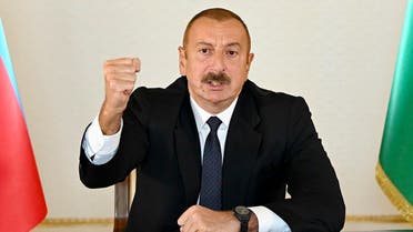 In this photo provided by the Azerbaijan's Presidential Press on Sept. 27, 2020, Azerbaijani President Aliyev addresses the nation in Baku, Azerbaijan. (Azerbaijani Presidential Press Office via AP)