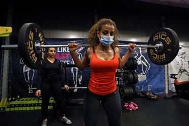 A Saudi woman Balqees, works out at a gym, amid the spread of the coronavirus disease (COVID-19), in Riyadh, Saudi Arabia. (Reuters)