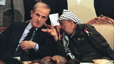 Yasser Arafat (R), chairman of Palestine Liberation OrganisAtion (PLO) shown in file picture dated 01 September 1989. (AFP)