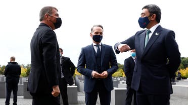 UAE Foreign Minister Sheikh Abdullah bin Zayed al-Nahyan and his Israeli counterpart Gabi Ashkenazi greet as they visit the Holocaust memorial together with German Foreign Minister Heiko Maas prior to their historic meeting in Berlin, Germany October 6, 2020. (Reuters)