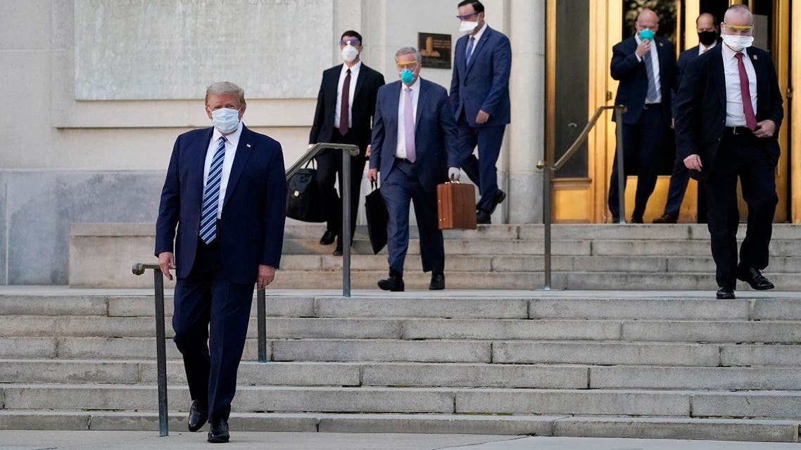 President Donald Trump walks out of Walter Reed National Military Medical Center after receiving treatments for coronavirus, , Oct. 5, 2020. (AP)