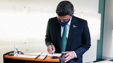 UAE’s Minister of Foreign Affairs Sheikh Abdullah bin Zayed writes in the visitors’ book at the Memorial to the Murdered Jews of Europe memorial in Berlin, Germany, on October 6. (WAM)