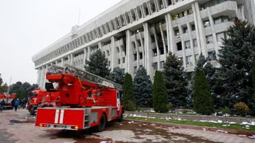 Fire brigade trucks are seen in front of the government headquarters which has been taken over by protesters against the results of a parliamentary election in Bishkek, Kyrgyzstan, October 6, 2020. (Reuters)