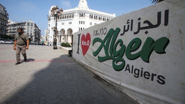 A man walks past an “I love Algiers” banner near the central post office in Algiers, Algeria September 16, 2020. Picture taken September 16, 2020. (Reuters)