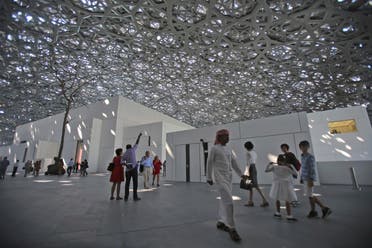 People visit the Louvre Museum during the public opening day, in Abu Dhabi, United Arab Emirates, Saturday, Nov. 11, 2017. (AP)