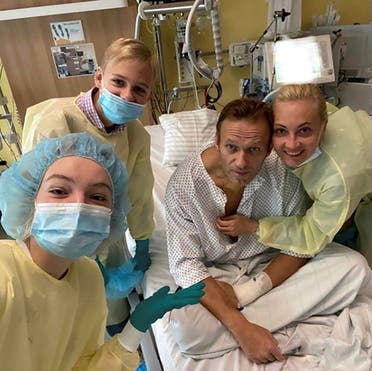Russian opposition politician Alexei Navalny and his family members at Charite hospital in Berlin, Germany, in this undated image obtained from social media Sept. 15, 2020 after his poisoning. (Reuters)