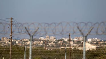 Fenced-in area of Varosha, restricted by the Turkish military is seen from Dherinia checkpoint. (Reuters)
