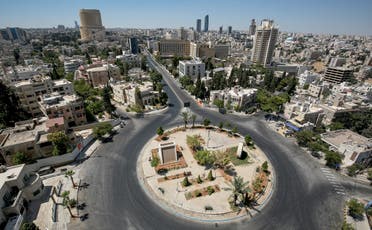 A view of an empty roundabout during a coronavirus pandemic curfew in the center of Jordan's capital Amman. (AFP)