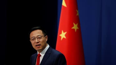 Chinese Foreign Ministry spokesman Zhao Lijian attends a news conference in Beijing, China. (Reuters)1248606169_RC2KVI9D46RG_RTRMADP_3_AUSTRALIA-CHINA-JOURNALISTS