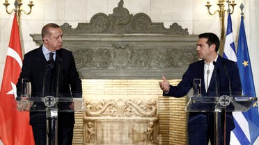 Greek Prime Minister Alexis Tsipras and Turkish President Tayyip Erdogan attend a press conference following their meeting at the Maximos Mansion in Athens, Greece December 7, 2017. (Reuters)