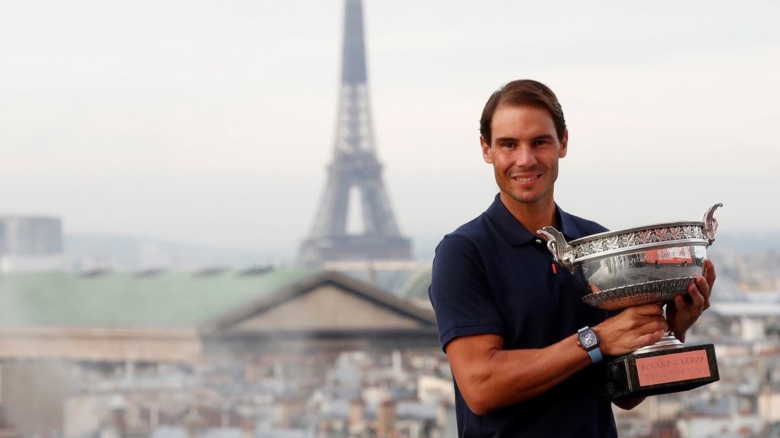 Spain’s Rafael Nadal poses with the trophy after winning the French Open on October 12, 2020. (Reuters)_817753060_RC2VGJ96GIZ2_RTRMADP_3_TENNIS-FRENCHOPEN