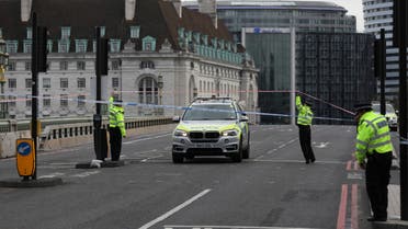 Police officers are seen at a closed off Westminster Bridge, in London, Britain October 13, 2020. REUTERS/Simon Dawson