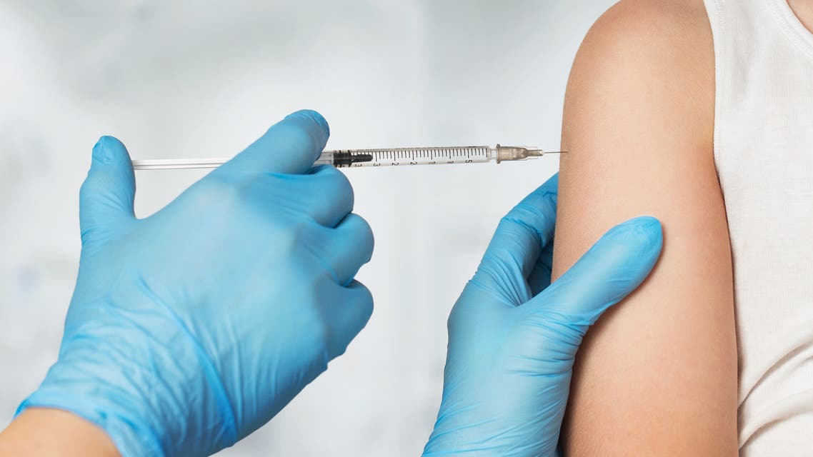 Close up of doctor's hands vaccinating child Medical vaccine stock photo