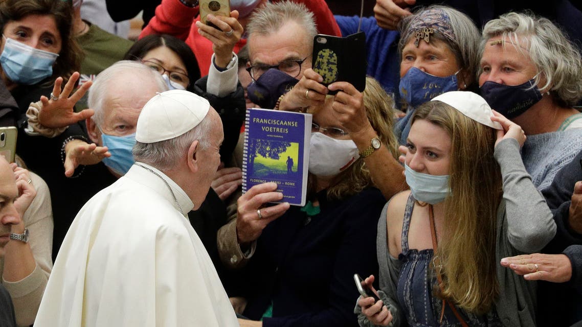Pope Francis arrives in the Paul VI hall on the occasion of his weekly general audience at the Vatican on Oct. 7, 2020. (AP)