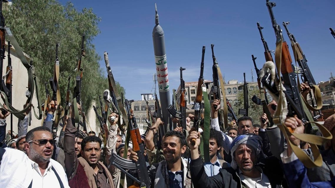 Houthis raise weapons as they chant slogans during a gathering aimed at mobilizing more fighters in Sanaa, Yemen, Feb. 25, 2020. (AP)