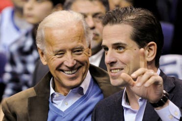 Joe Biden and his son Hunter Biden at an NCAA basketball game Washington, DC, Jan. 30, 2010. (Reuters)