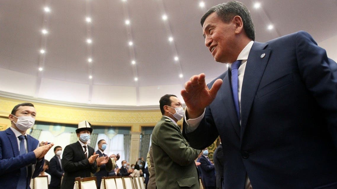 Kyrgyzstan's former President Sooronbai Jeenbekov reacts during an extraordinary session of parliament in Bishkek, Kyrgyzstan, on October 16, 2020. (Reuters)