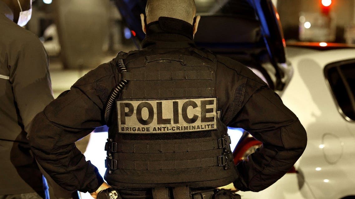 A French police officer of the anti-crime squad, Brigade Anti-Criminalite de nuit (BAC N 75) is seen during a control in Paris, Oct. 16, 2020. (AFP)