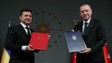 This handout photograph released by the Turkish Presidential Press Service on October 16,2020 shows Turkish President Tayyip Erdogan (R) and his Ukrainian counterpart Volodymyr Zelenskiy (L) attending a signing ceremony in Istanbul. (AFP)