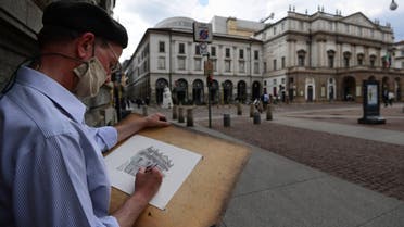 Italian painter Giovanni Franzi draws the Teatro alla Scala building on June 3, 2020 in downtown Milan, as the country eases its lockdown aimed at curbing the spread of the COVID-19 infection, caused by the novel coronavirus. (AFP)