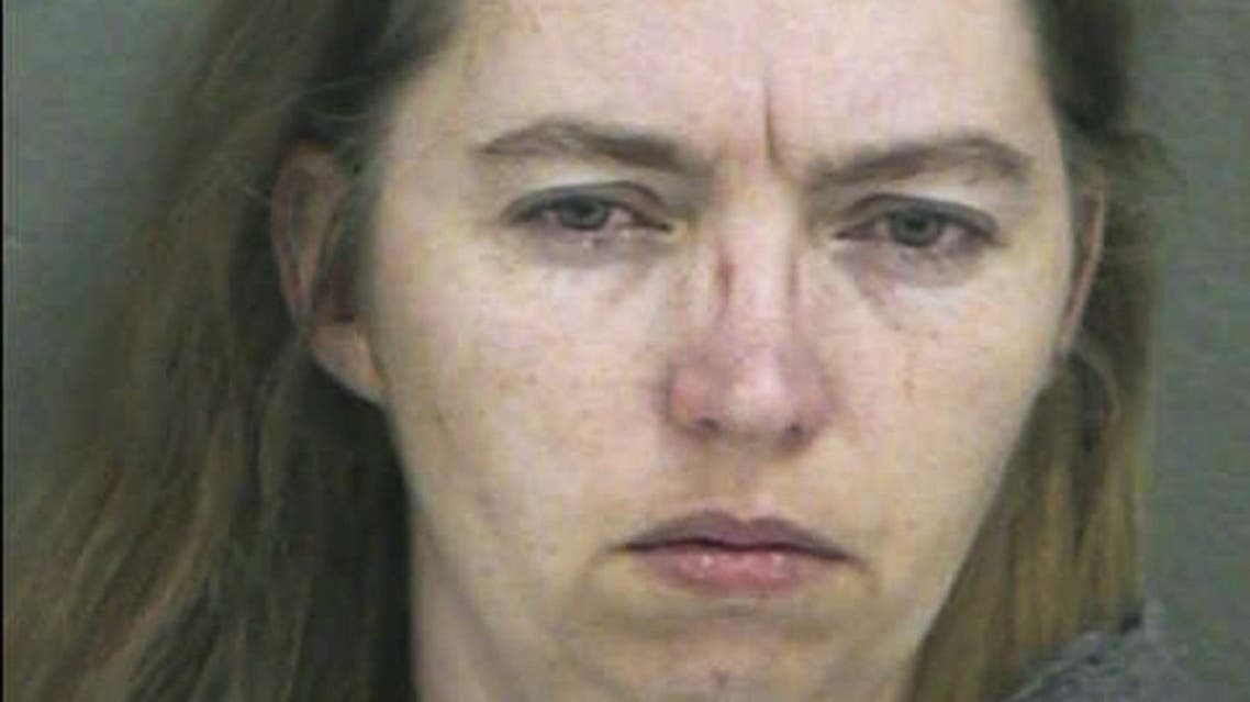 In this handout photo provided by the Wyandotte County Sheriff's Department, Lisa Montgomery appears in a booking photo released 20 December 2004 in Kansas City, Kansas. (AFP)