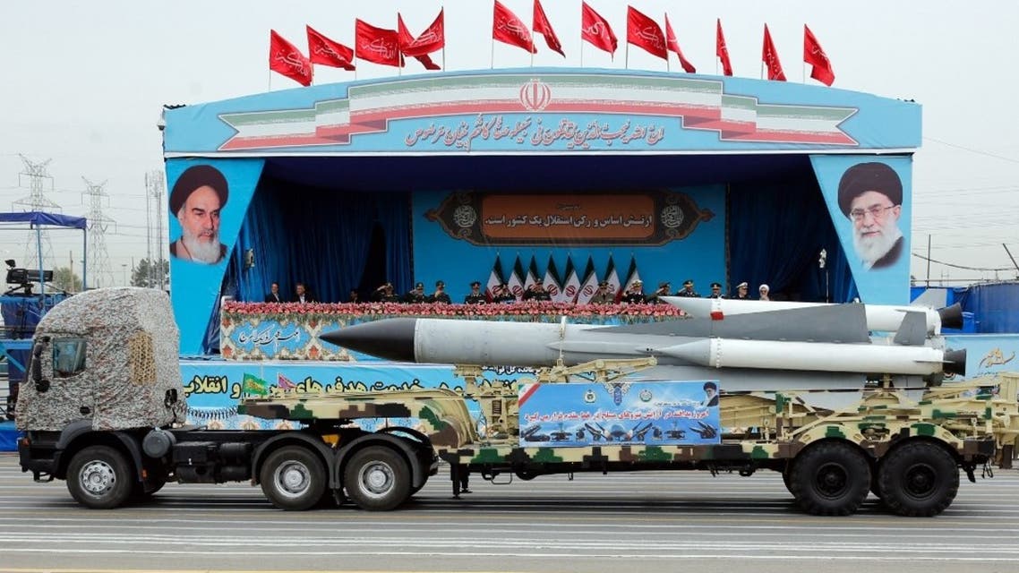 A Iranian military truck carrying a missile drives in front of the officials' stand during a military parade marking the annual National Army Day in Tehran, on April 18, 2019. (AFP)