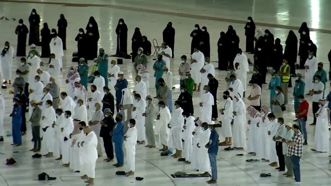 Group of worshipers pray Fajr (the dawn prayer) in front of the Holy Kaaba, Islam’s holiest site, on October 18, 2020. (Screengrab/@alekhbariyatv)