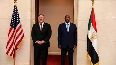 A handout picture provided by Sudan's Foreign Media Council shows US Secretary of State Mike Pompeo (L) posing for a picture with Sudan's Sovereign Council chief General Abdel Fattah al-Burhan in Khartoum on August 25, 2020. Pompeo is on an official visit to Sudan to urge more Arab countries to normalise ties with Israel, following the US-brokered Israel-UAE agreement. He is the first American top diplomat to visit Sudan since Condoleezza Rice went in 2005.