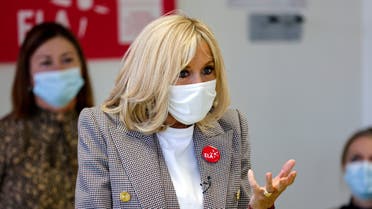 Brigitte Macron gives a dictation to school children in support for the European Leukodystrophy Association (ELA), at a school in Paris, France October 12, 2020. Thomas Coex/Pool via REUTERS