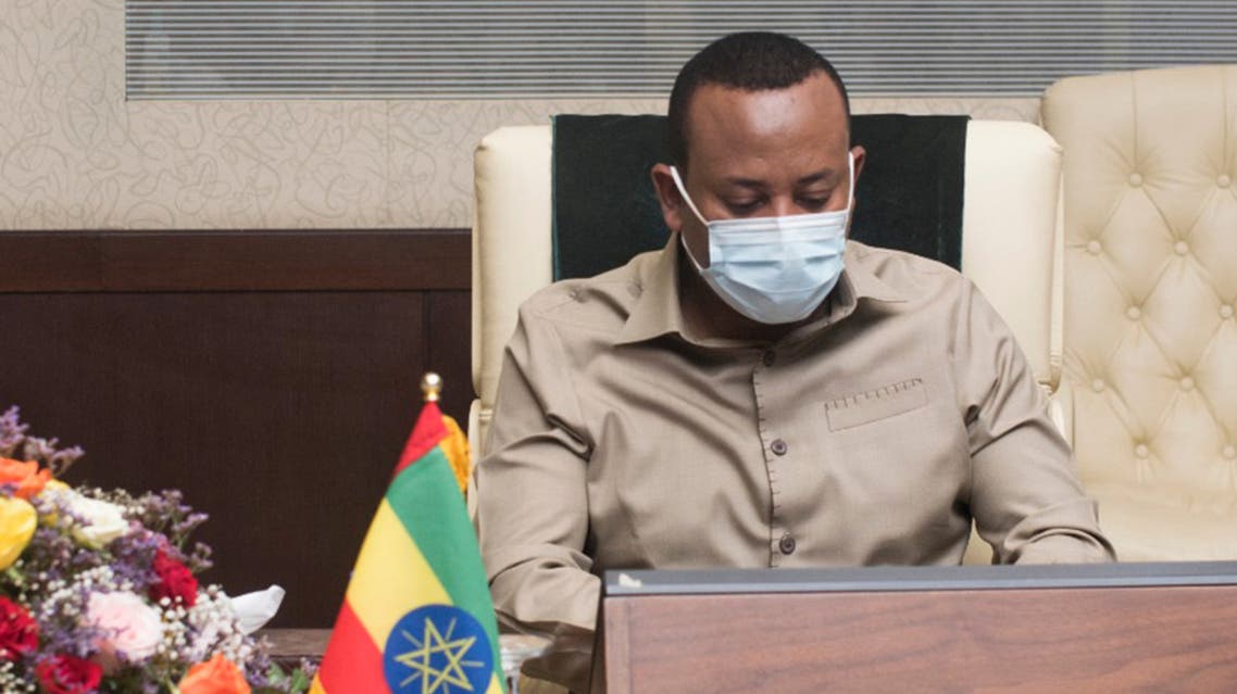 A handout picture provided by Sudan's Foreign Media Council shows Ethiopian Prime Minister Abiy Ahmed meeting with his Sudanese counterpart in Khartoum on August 25, 2020.