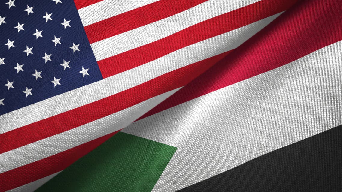 Sudan and United States two flags together textile cloth, fabric texture stock photo