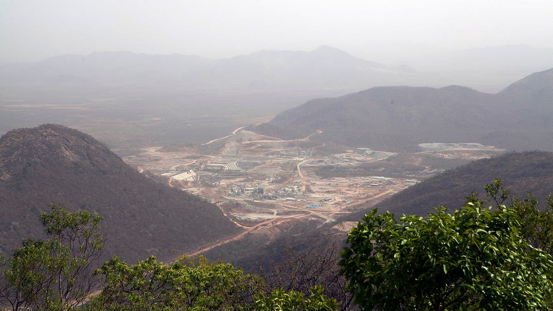 A photo taken on March 31, 2015 shows the Grand Renaissance Dam under construction near the Sudanese-Ethiopia border. Ethiopia began diverting the Blue Nile in May 2013 to build the 6,000 megawatt dam, which will be Africa's largest when completed in 2017. The leaders of Egypt and Ethiopia promised on March 24 to boost cooperation on the Nile river and turn a page on a long-running row over Addis Ababa's controversial dam project. Egypt, heavily reliant for millennia on the Nile for agriculture and drinking water, feared that the Grand Renaissance Dam would decrease its water supply. AFP PHOTO / ZACHARIAS ABUBEKER