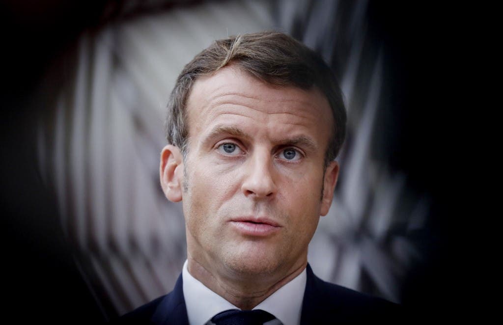 French President Emmanuel Macron, speaks to the press as he arrives ahead of a two days European Union (EU) summit at the European Council Building in Brussels, on October 15, 2020. (AFP)