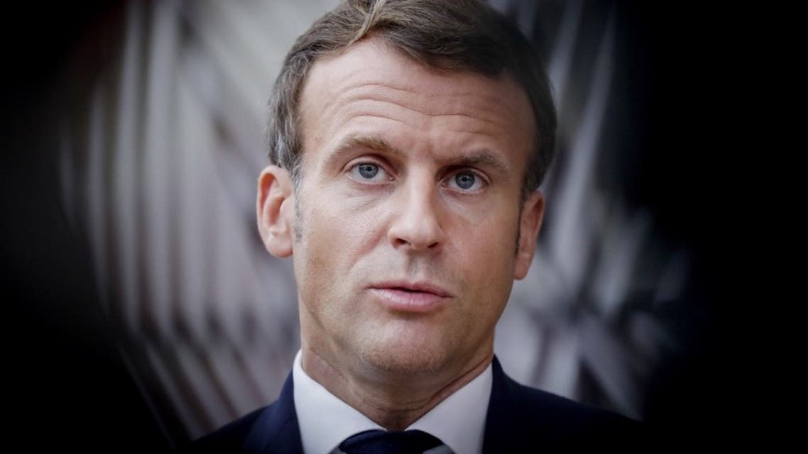 French President Emmanuel Macron, speaks to the press as he arrives ahead of a two days European Union (EU) summit at the European Council Building in Brussels, on October 15, 2020. (AFP)