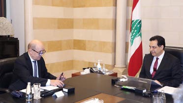 Lebanon's PM Hassan Diab meets with French Foreign Affair Minister Jean-Yves Le Drian at the governmental palace in Beirut, July 23, 2020. (Reuters)