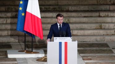 French President Emmanuel Macron delivers a speech in front of Samuel Paty’s coffin (unseen) inside Sorbonne University’s courtyard in Paris on October 21, 2020. (AFP)
