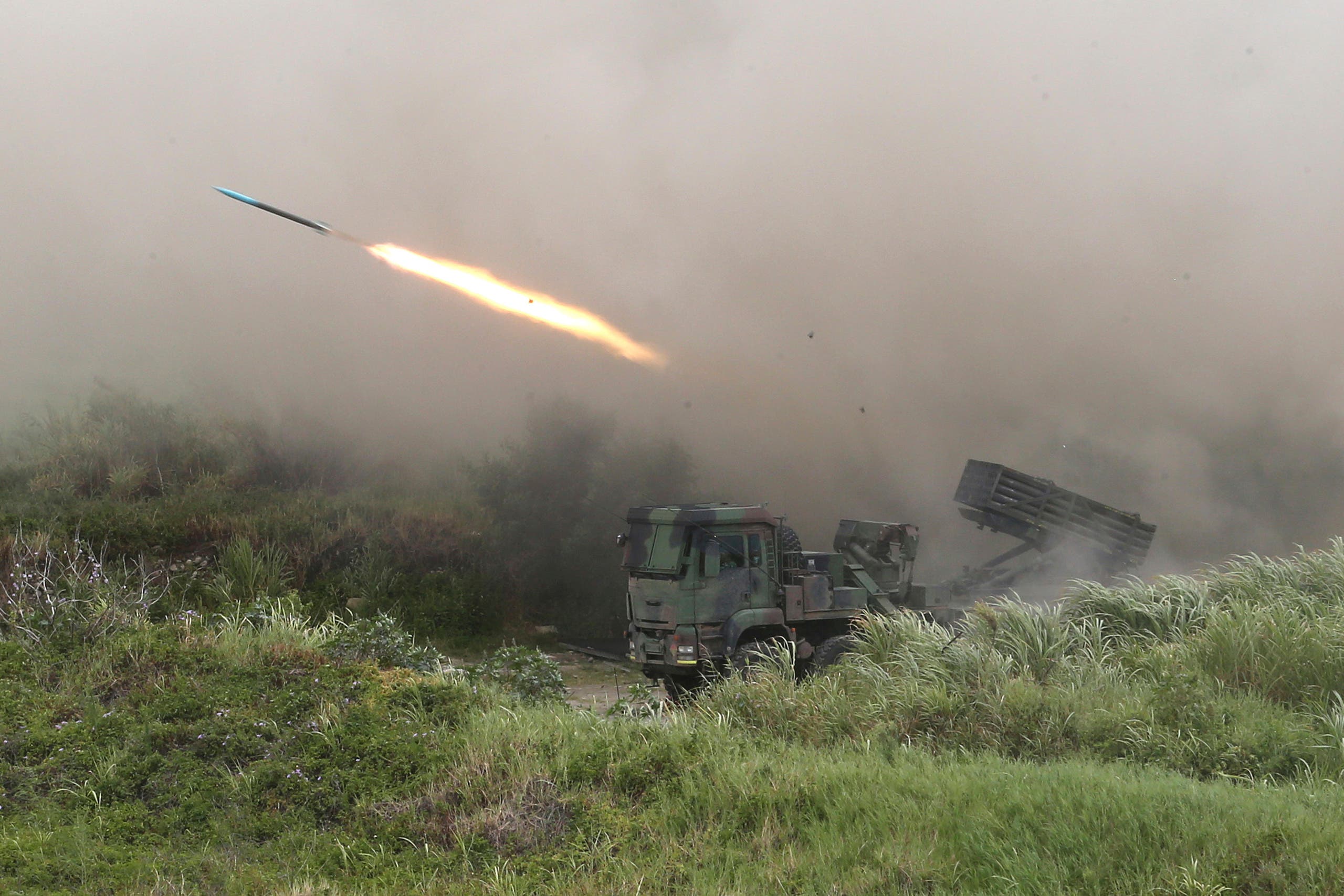 A rocket is fired from a Thunderbolt 2000 multi-rocket launcher during the 36th Han Kung military exercises in Taichung City, central Taiwan. (AP)