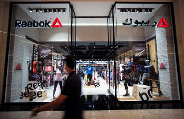 A man walks in front of the Reebok store at Bahrain City Center in Manama, Bahrain. (File photo: Reuters)