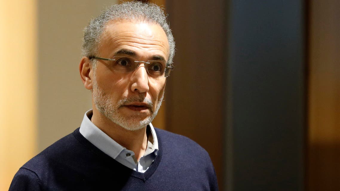 (FILES) In this file photo taken on February 13, 2020 Swiss leading Islamic scholar Tariq Ramadan arrives at the Palais de Justice (Law Court) of Paris. Tariq Ramadan, already charged with raping four women, was indicted again on October 22, 2020, for several rapes in 2013-2014 denounced by one of his first accusers, Mounia Rabbouj, AFP learned from his lawyers.