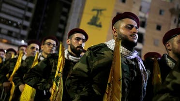 Hezbollah fighters stand in formation at a rally to mark Al-Quds day, in a southern suburb of Beirut, May 31, 2019. (AP)