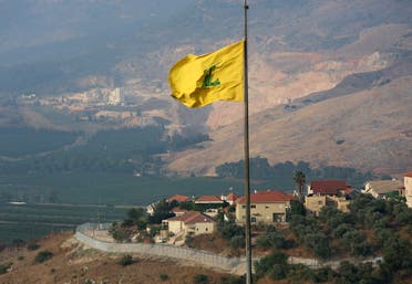 A Hezbollah flag flutters in the southern Lebanese village of Khiam, near the border with Israel, Lebanon July 28, 2020. (Reuters)