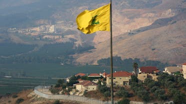 A Hezbollah flag flutters in the southern Lebanese village of Khiam, near the border with Israel, Lebanon July 28, 2020. (Reuters)