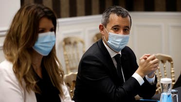 French Interior Minister Gerald Darmanin (R) and French Junior Minister of Citizenship Marlene Schiappa attend a meeting on October 5, 2020, at the Interior ministry in Paris. (Thomas Coex /Pool /AFP)