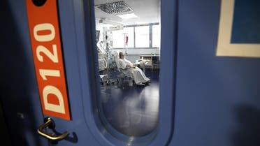 A patient is hospitalised in an intensive care unit for patients infected with Covid-19 (novel coronavirus) at the University Hospital of Strasbourg (HUS) in Strasbourg, eastern France. (AFP)