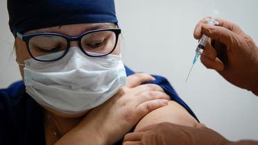 A medic of the regional hospital receives Russia's Sputnik-V vaccine shot against the coronavirus disease (COVID-19) in Tver. (Reuters)