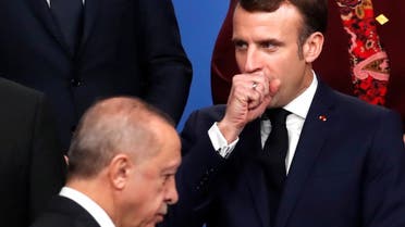 France's President Emmanuel Macron gestures next to Turkey's President Recep Tayyip Erdogan. (Reuters)