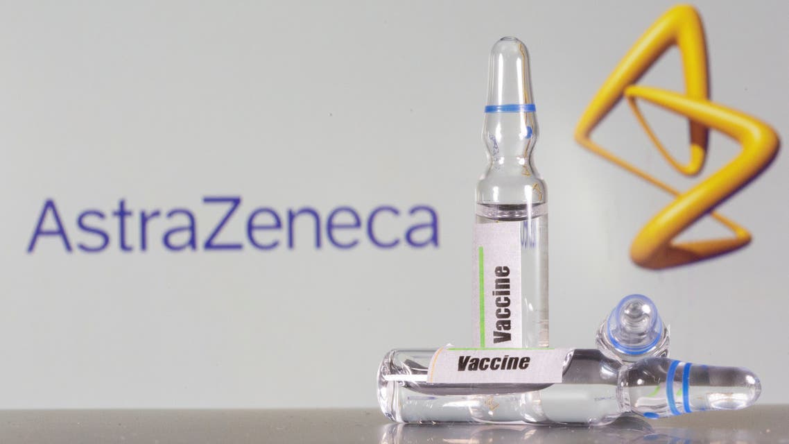 FILE PHOTO: A test tube labelled with the Vaccine is seen in front of AstraZeneca logo in this illustration taken, September 9, 2020. REUTERS/Dado Ruvic/Illustration/File Photo