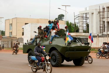 A Russian armored personnel carrier (APC) is seen driving in the street during the delivery of armored vehicles to the Central African Republic army in Bangui, October 15, 2020. (Camille Laffont/AFP)