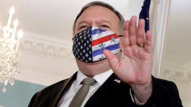 FILE PHOTO: U.S. Secretary of State Mike Pompeo waves before his meeting with Romania's Foreign Minister Bogdan Aurescu at the State Department in Washington, U.S., October 19, 2020. REUTERS/Yuri Gripas?/File Photo