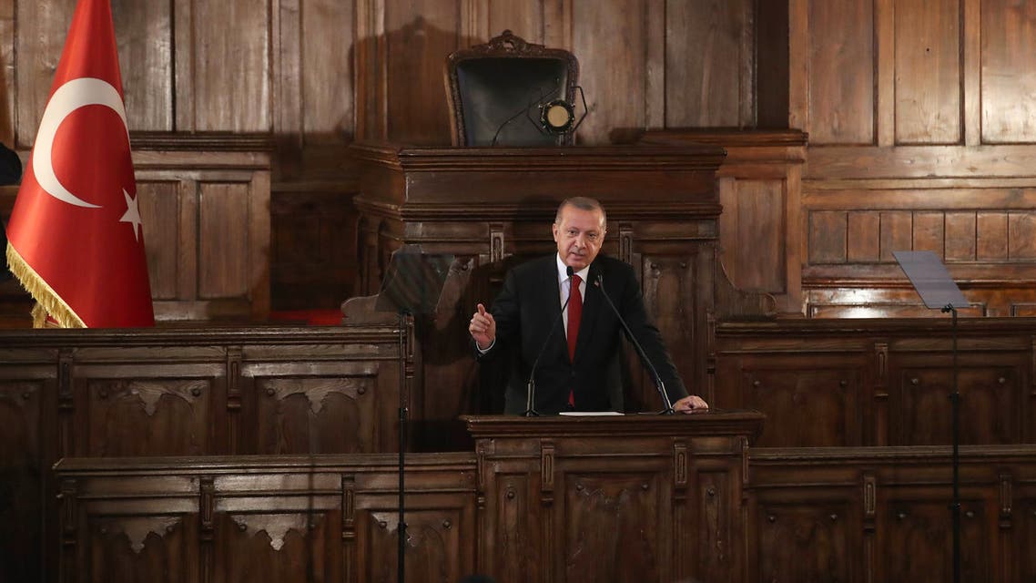 Turkey's President Recep Tayyip Erdogan delivers a speech at the former parliamentary building in Ankara on July 13, 2018. 